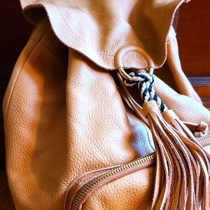 Soft leather bag back pack, made in Brazil.